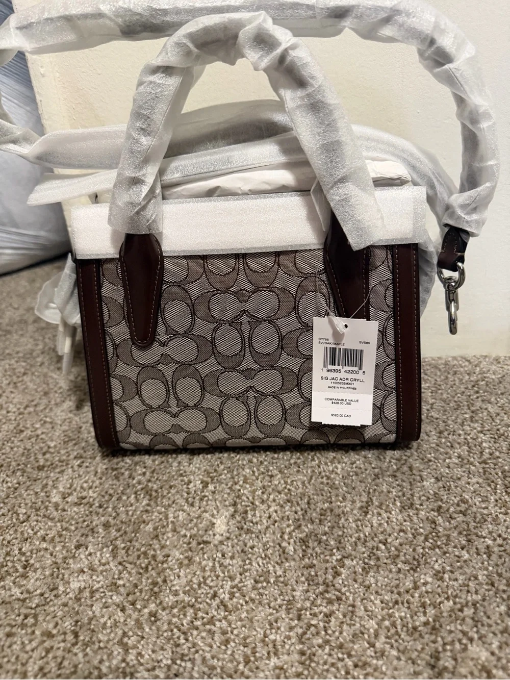 Coach Signature purse with Brown Leather Trim